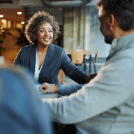 Three people having a friendly meeting.