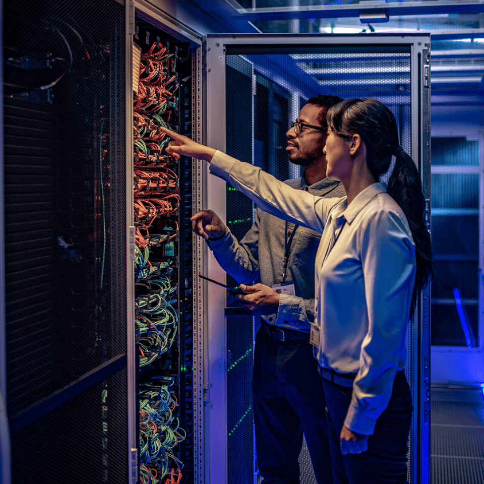 engineers in a server room