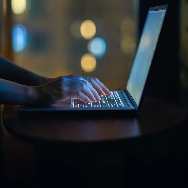 typing-on-laptop-card