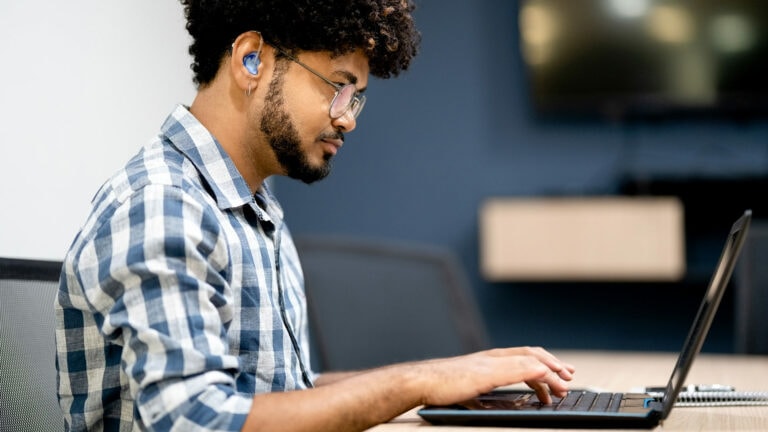 man-with-hearing-aid-accessibility-banner