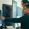 two people working together