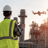Drone inspecting industrial facility.
