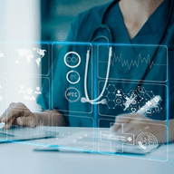 A doctor working on a futuristic laptop