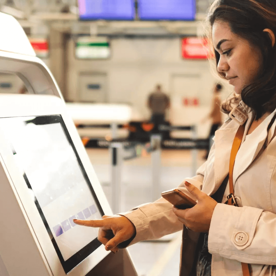 A woman navigating an app through a screen