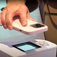 A man scanning his phone