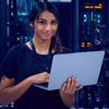 girl holding a computer