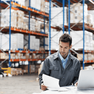 A man in a wearhouse