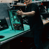 A man repairing a device