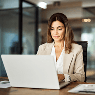 woman on laptop card