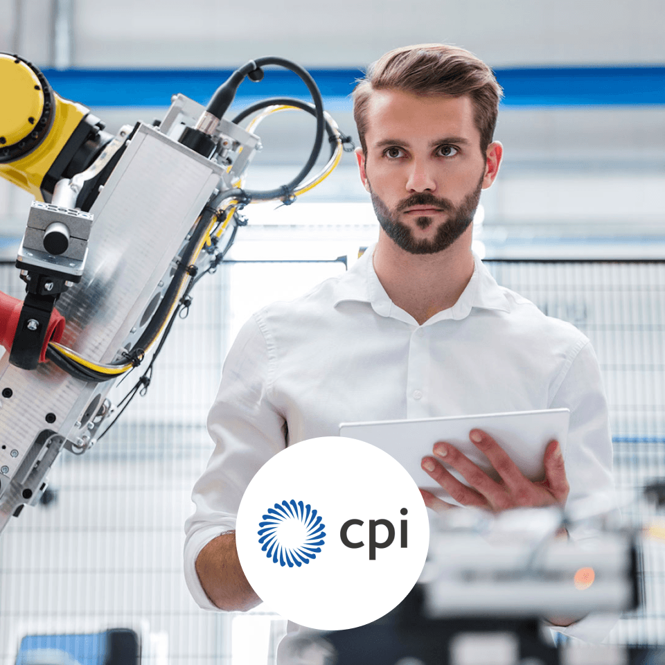 Engineer operating robotic arm.