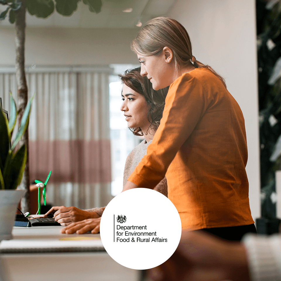 Two women working together